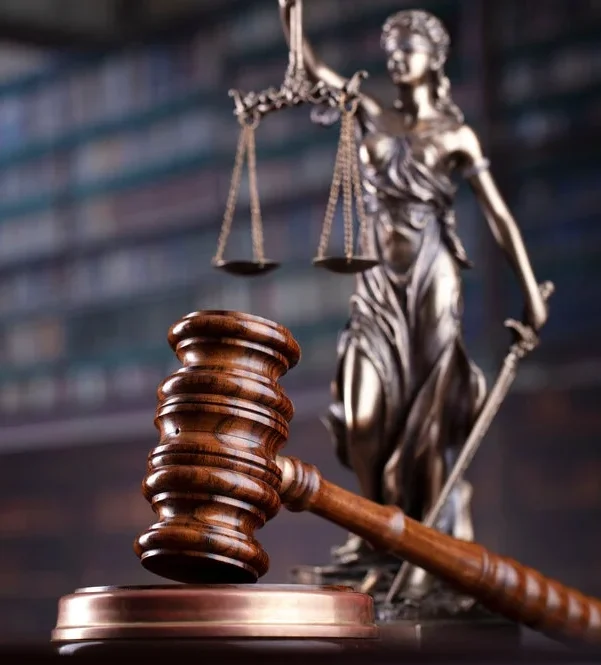 Judge's gavel on library background. Law and justice concept.