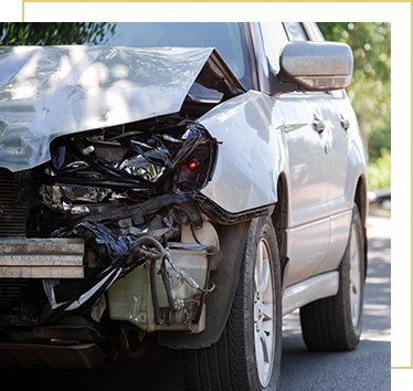 Destroyed car in car crash traffic accident on city road on city road