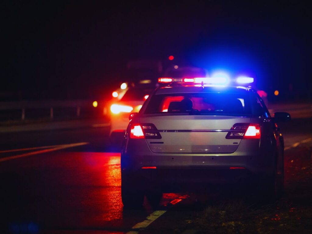 DUI stop in Southern California: A police officer stopping a car on the road for a suspected DUI