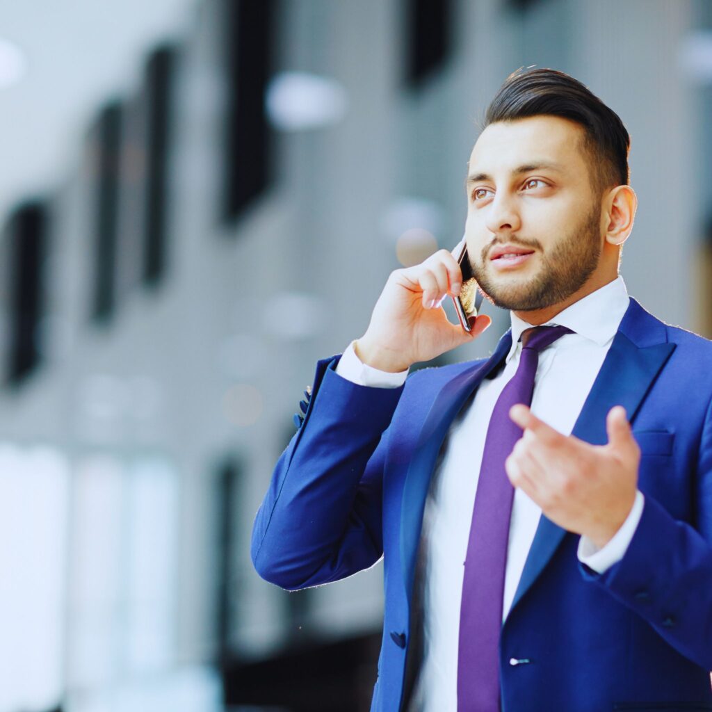 Traffic ticket lawyer on a phone call with a client discussing traffic tickets.