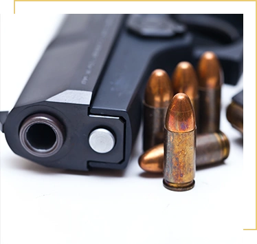 9 mm Black handgun isolated on a white background.